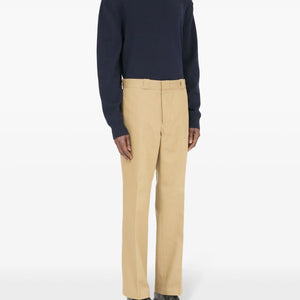 PLEATED PRESSED-CREASE TROUSERS