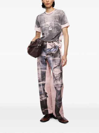 Acne Studios trompe l'oeil trousers. Photorealistic prints and sculptural silhouettes. Where art meets everyday style. Available at our Lisbon store.