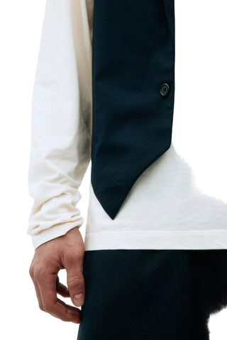 Adnym Athletics Gimey Vest, longer front, raw seam details, and a slim fit for a modern utility in navy viscose-blend fabric. Available at our Lisbon store. 