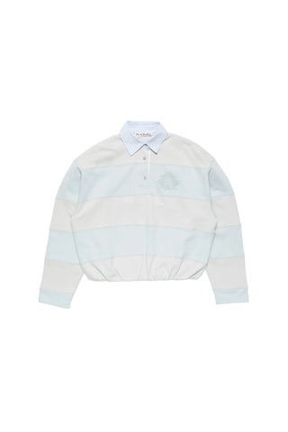 Striped polo sweatshirt in cotton fleece with acid-washed finish. Polo piqué collar, crest-inspired logo patch, and balloon hem. Available at our Lisbon store.