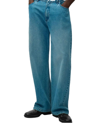 Arte Antwerp blue straight‑leg logo trousers with five pockets and belt loops. Refined street style, available at our Lisbon store.