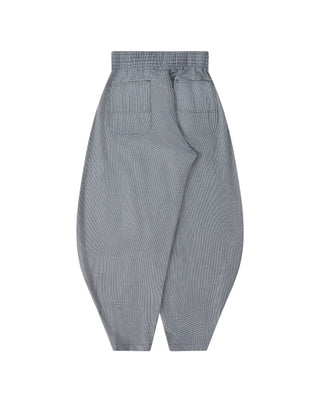 BLACK Comme des Garçons houndstooth balloon trousers. A voluminous wide-leg shape with an elasticated waist and an eye-catching houndstooth pattern. 