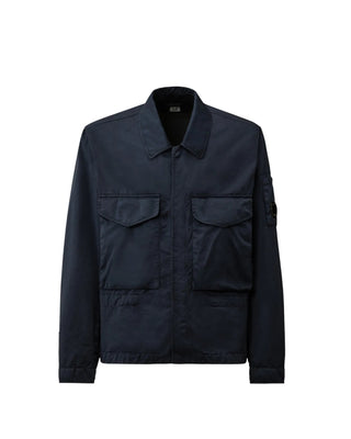 C.P. Company Pro-Tek bomber jacket with Lens detail and stretch fabric. Lightweight and protective, available at our Lisbon store.