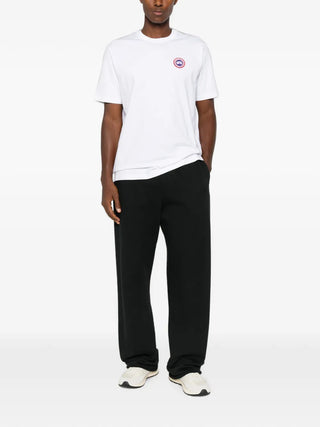 Canada Goose Ocra logo-patch t-shirt. Iconic logo patch, crew neck, and premium organic cotton. Timeless style, available at our Lisbon store. 