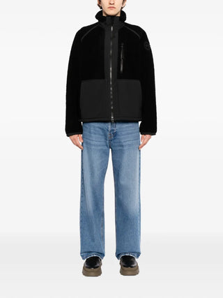 Canada Goose Westport fleece jacket. A sustainable, breathable design with a logo patch and durable ripstop trims. Available at our Lisbon store. 