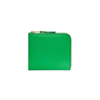 COMME DES GARÇONS classic leather wallet. Smooth cowhide, zip-around closure, card slots, note and coin compartments. Available at our Lisbon store.