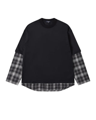 COMME DES GARÇONS HOMME layered T-shirt. Relaxed, loose fit in pure cotton. A signature street-ready piece. Available at our Lisbon store.