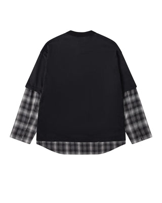 COMME DES GARÇONS HOMME layered T-shirt. Relaxed, loose fit in pure cotton. A signature street-ready piece. Available at our Lisbon store.