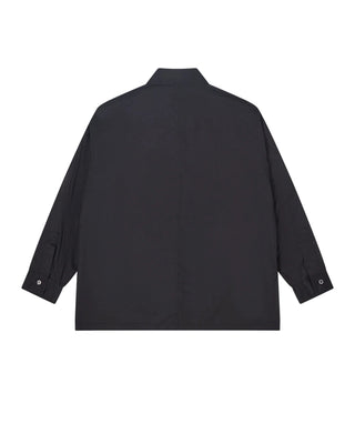 COMME DES GARÇONS HOMME technical zip shirt. Signature exposed zip placket, classic shirting and 100% cotton. Available at our Lisbon store. 