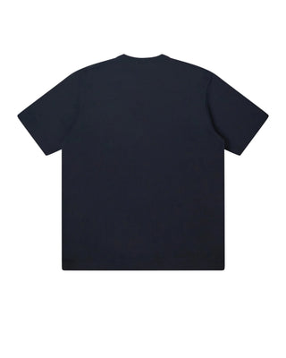 COMME DES GARÇONS Homme logo T-shirt. Classic relaxed fit, pure cotton and printed logo at the chest. A timeless essential. Available at our Lisbon store. 