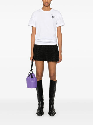 Comme des Garçons PLAY crew-neck T-shirt with black heart patch logo. Soft cotton jersey construction with classic silhouette.  Available at our Lisbon store.