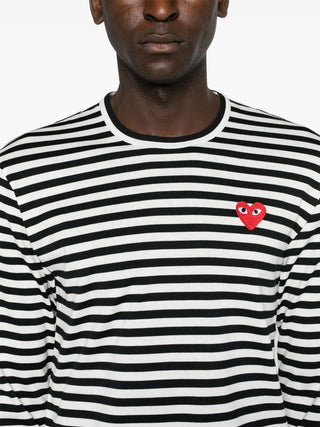 PLAY striped T-shirt by Comme des Garçons featuring signature heart motif. Cotton jersey construction with nautical stripe pattern and embroidered patch. 