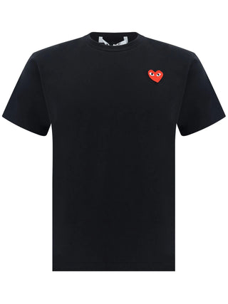 Comme des Garçons PLAY heart logo T-shirt. Embroidered or appliquéd heart motif. Pure cotton, regular fit. A cult classic, available at our Lisbon store.