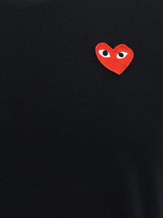 Comme des Garçons PLAY heart logo T-shirt. Embroidered or appliquéd heart motif. Pure cotton, regular fit. A cult classic, available at our Lisbon store.