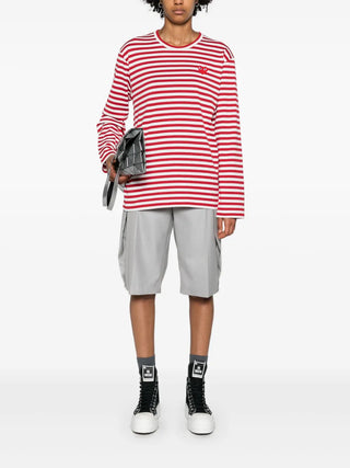 Comme des Garçons PLAY striped T-shirt with iconic heart patch logo. Horizontal stripes in contrasting colors. Embroidered red heart-logo with eyes. 