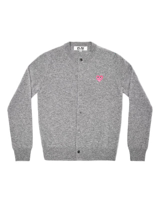 CDG PLAY round-neck cardigan in 100% wool. A unisex grey knit with a ribbed neckline and iconic heart patch, perfect for everyday layering. 