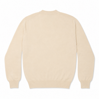 Comme Des Garçons PLAY round-neck cardigan in a neutral shade with the iconic heart emblem. A classic 100% wool knit with front button closure.