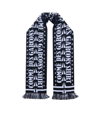 COMME DES GARÇONS SHIRT's football scarf. Where classic fan culture meets graphic design. Available at our Lisbon store. 