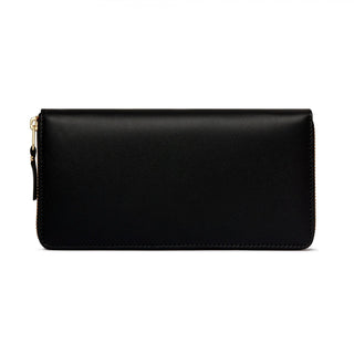 Crafted in Spain from premium leather, the Comme des Garçons Wallet Classic Line embodies  minimalism with refined craftsmanship and everyday functionality.