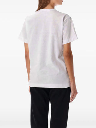 PLAY T-shirt by Comme des Garçons featuring the signature heart motif. Premium breathable cotton with regular silhouette.  Available at our Lisbon store.
