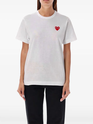 PLAY T-shirt by Comme des Garçons featuring the signature heart motif. Premium breathable cotton with regular silhouette.  Available at our Lisbon store.