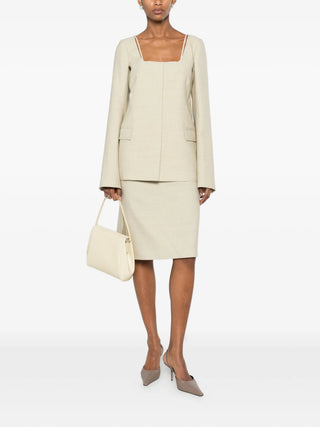 Calvin Klein Collection Camille neutral jacket with square neck and clean fit, available at our Lisbon store.