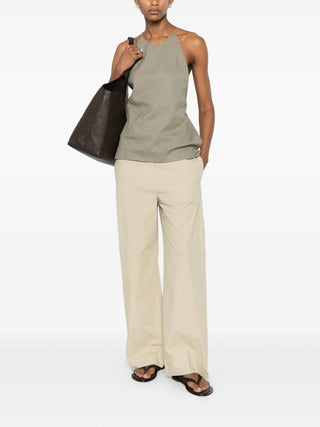 Calvin Klein Collection Gemma wide-leg trousers in neutral with zip details, available at our Lisbon store.