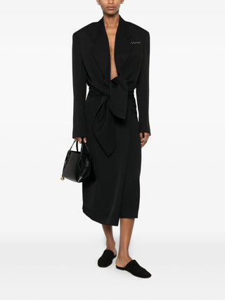Calvin Klein Collection Hallie black wrap skirt with tie fastening, available at our Lisbon store.