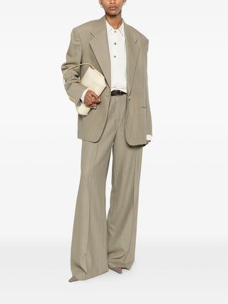 Calvin Klein Collection Helga off-white polo with long sleeves and clean fit, available at our Lisbon store.