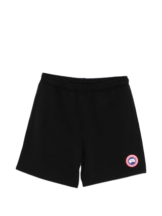 Black shorts with a logo by Canada Goose on a white background