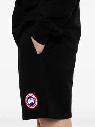 Black skirt with a brand logo by Canada Goose on a white background