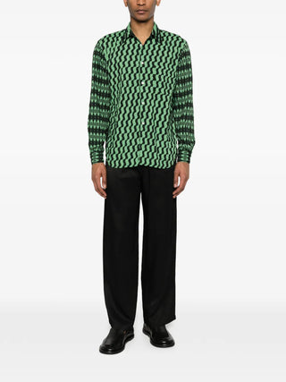 Comme des Garçons Homme Plus green and black geometric print shirt with long sleeves. Artistic design, available at our Lisbon store.