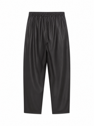 Dusan Tasmania carrot pants. Signature tapered silhouette with a high, elasticated waist. Crafted from 100% wool for a fluid, refined look. Made in Italy.