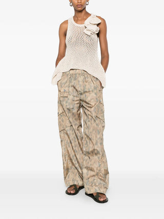 GANNI leopard print flyweight nylon trousers with cargo pockets and relaxed fit, available at our Lisbon store.