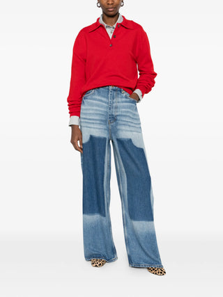Ganni Light Weight Denim Baggy Jeans in soft blue with five pockets and relaxed fit. Effortless style available at our Lisbon store.