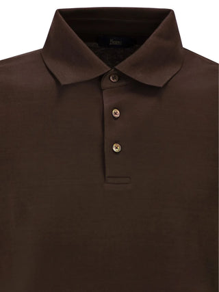 The Cotton Polo Shirt by Herno. Expertly crafted in soft, breathable cotton with a refined fit. Understated luxury available at our Lisbon store.