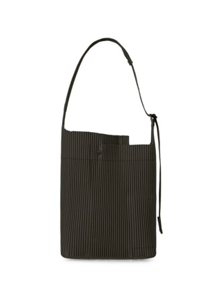 Homme Plissé Issey Miyake dark brown plissé shoulder bag with adjustable strap, available at our Lisbon store.
