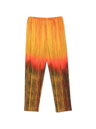 Homme Plissé Issey Miyake orange pleated trousers with elasticated waist and straight leg. Lightweight and expressive, available at our Lisbon store.