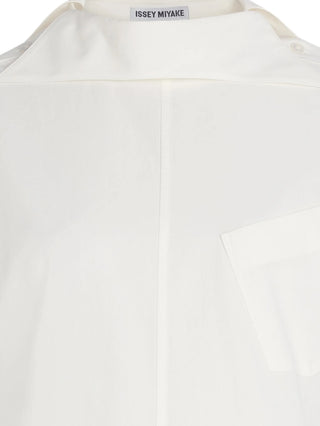 Close-up of a white garment with 'Issey Miyake' logo