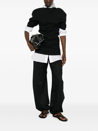 Issey Miyake black draped mini dress with slim fit, rear zip and clean lines. Modern and versatile, available at our Lisbon store.