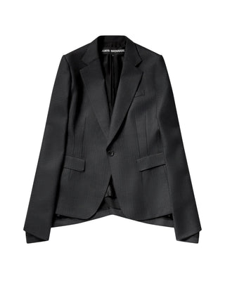 JUNYA WATANABE cut-out sleeve blazer. Single-breasted, charcoal pinstripe wool, and asymmetric hem. Available at our Lisbon store. 
