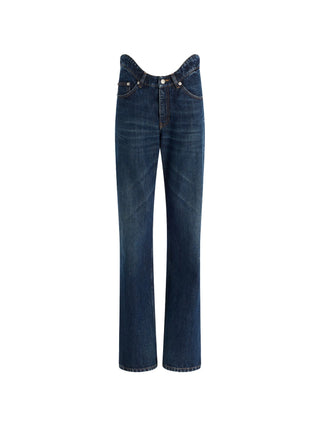 Jean Paul Gaultier indigo straight-leg jeans in cotton with a curvy waistband and engraved details. Structured fit, available at our Lisbon store.