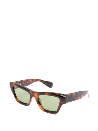 Jil Sander tortoiseshell cat-eye acetate sunglasses with tinted lenses. Refined and versatile, available at our Lisbon store.