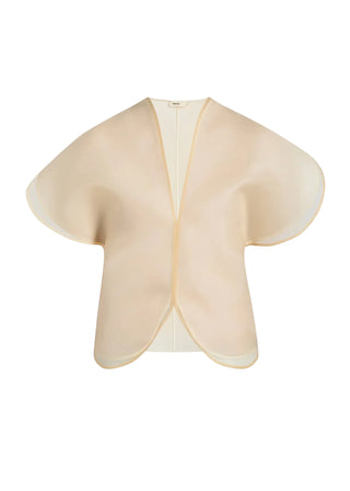 KHAITE Briar top. Silk organza, sculptural sleeves, and a notched V-neck. Made in Italy. A modern statement piece, available at our Lisbon store. 