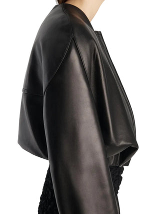 KHAITE Cordan jacket. A reimagined bomber in soft nappa leather. Cropped, rounded silhouette with signature armhole seaming and elasticated trims. 