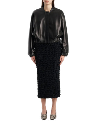 KHAITE Cordan jacket. A reimagined bomber in soft nappa leather. Cropped, rounded silhouette with signature armhole seaming and elasticated trims. 