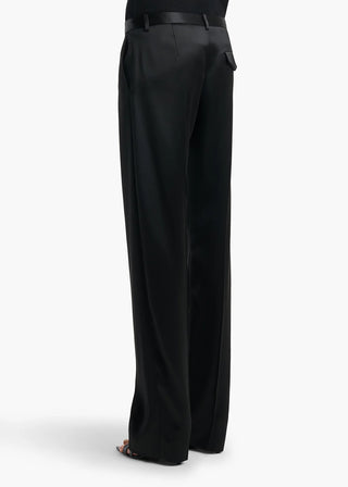 KHAITE Hunter tailored trousers. Italian virgin wool and cashmere blend in a straight-leg fit. A signature silhouette with a concealed front fastening. 