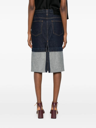Khaite denim skirt with back pockets. 