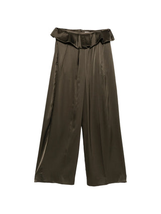 KHAITE Kira trousers. Oversized, mid-rise, and sculpted from the pleated waist. Architectural tailoring with fluid, refined drape. Available at our Lisbon store