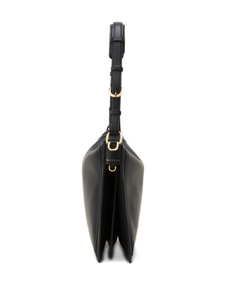 Black leather handbag with gold accents by Lanvin